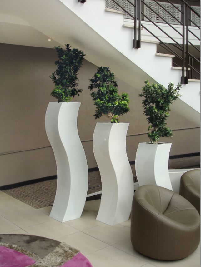 Curvy S Plant Displays are located under the stairs of this Midlands office Reception