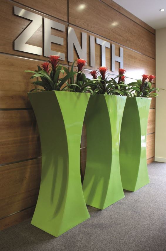 Curvy Sophia with flowering Plants in this West Midlands building Reception