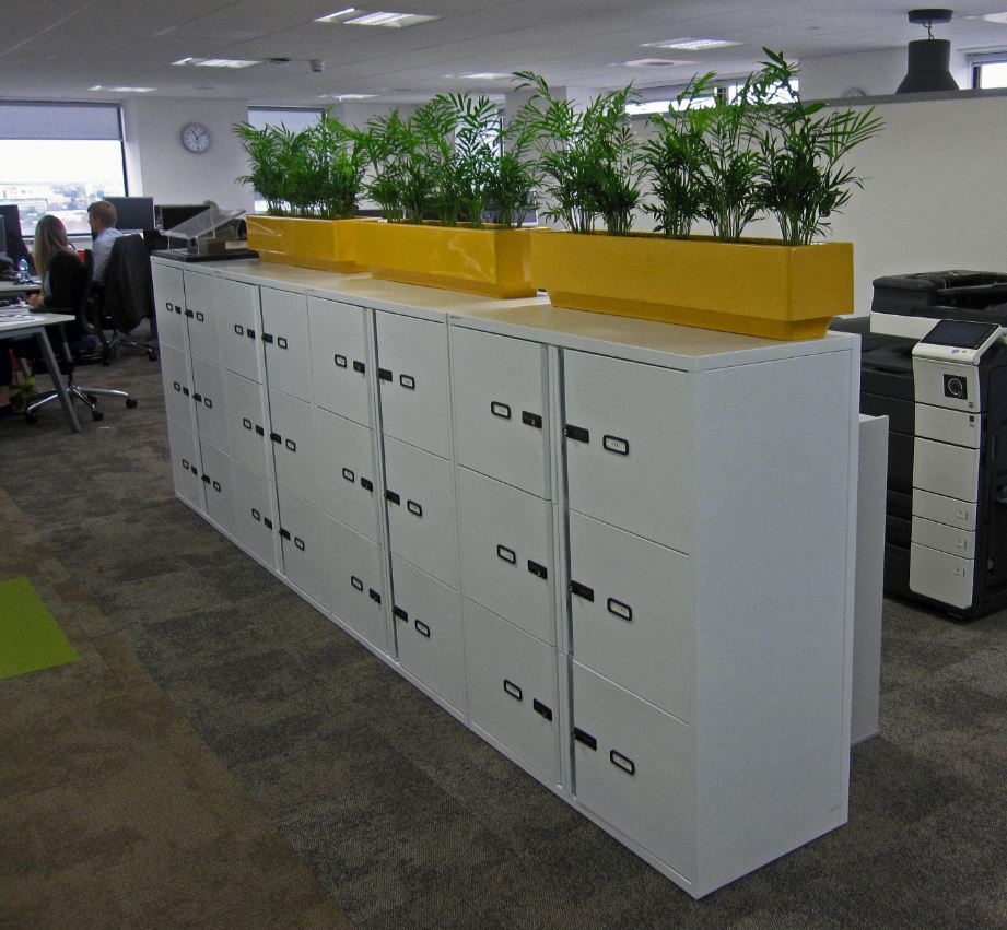 Cabinet top planters on the 17th floor of Birmingham office block