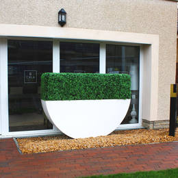 Artificial Buxus Hedging In A Tall Rectangular Planter For East Midlands Housing Scheme