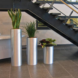 Tall Circular Metal Displays in Blythe Valley Business Park Reception