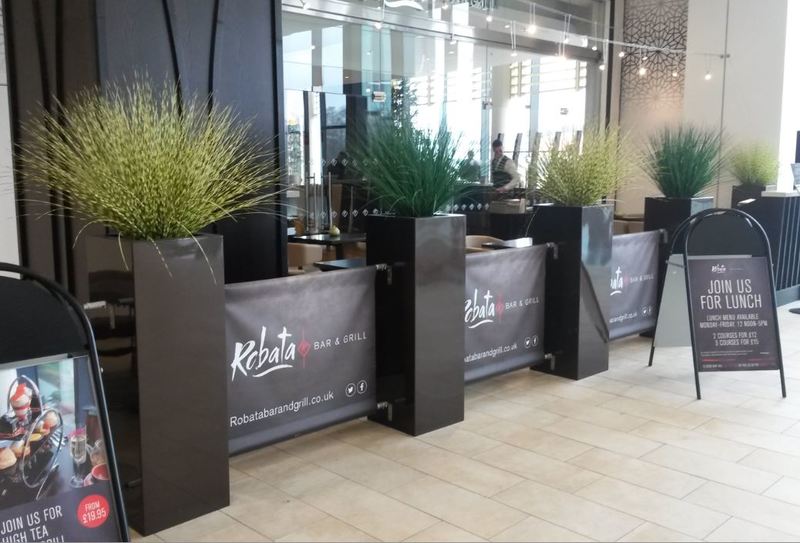 Tall square displays with Zebra Grass plants for this Solhull, Midlands, Restaurant & Office complex