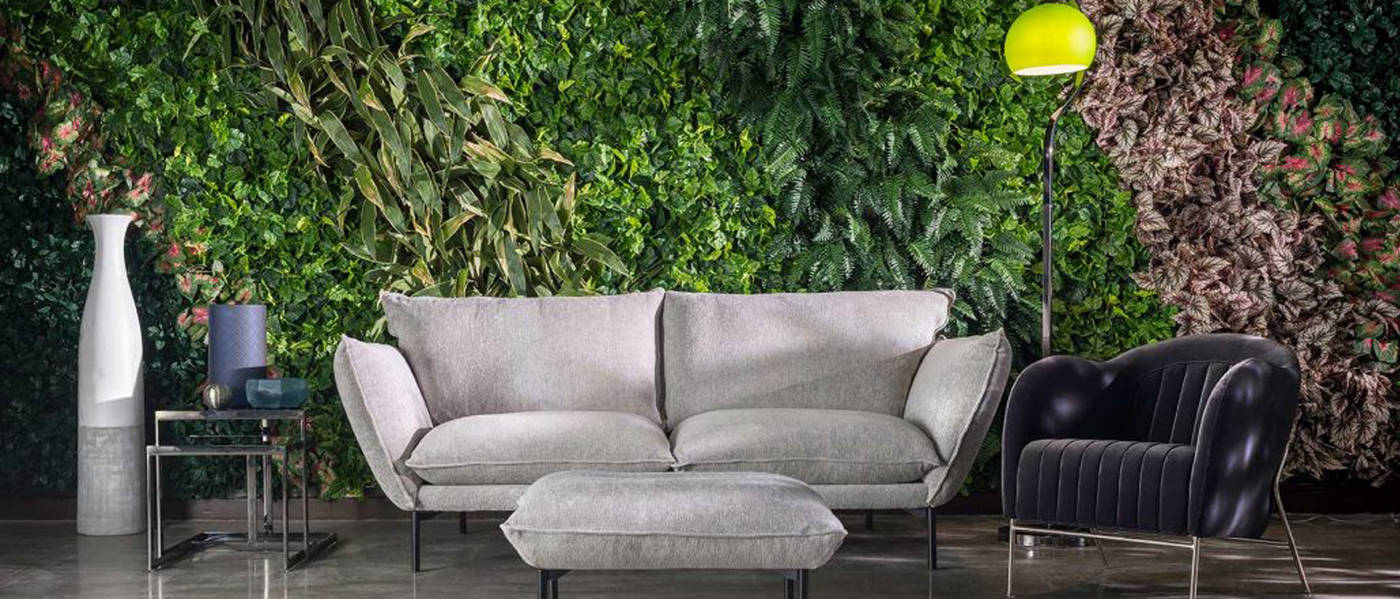 Artificial Green Wall with patterened planting in a Living area